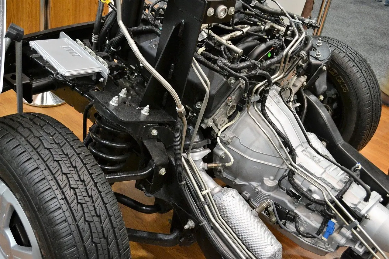 Exposed engine and drivetrain components in a workshop