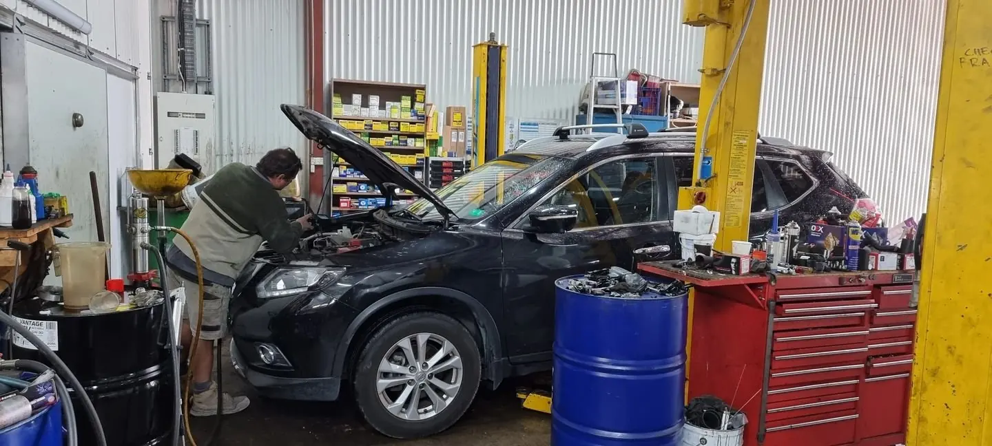 Vehicle being serviced inside Swiss Motors in Mona Vale